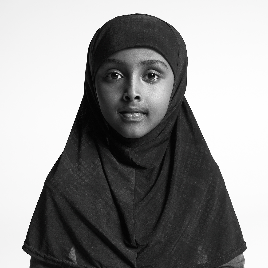 African American Girl in black hijab_black and white portrait