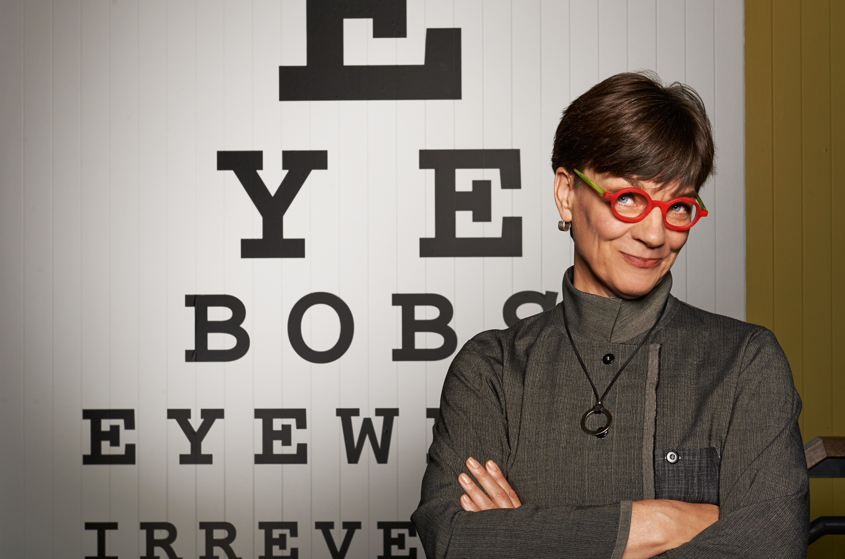 Sassy portrait of Woman CEO and creator of Eyebobs Red glasses