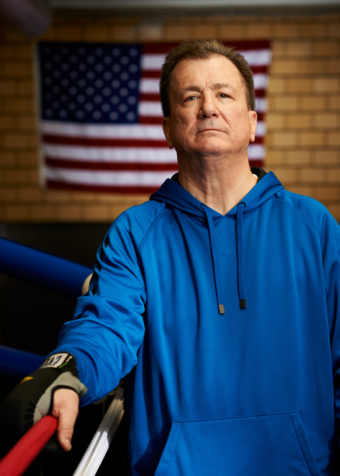 White Ex Cop Boxing Coach in Blue sweatshirt