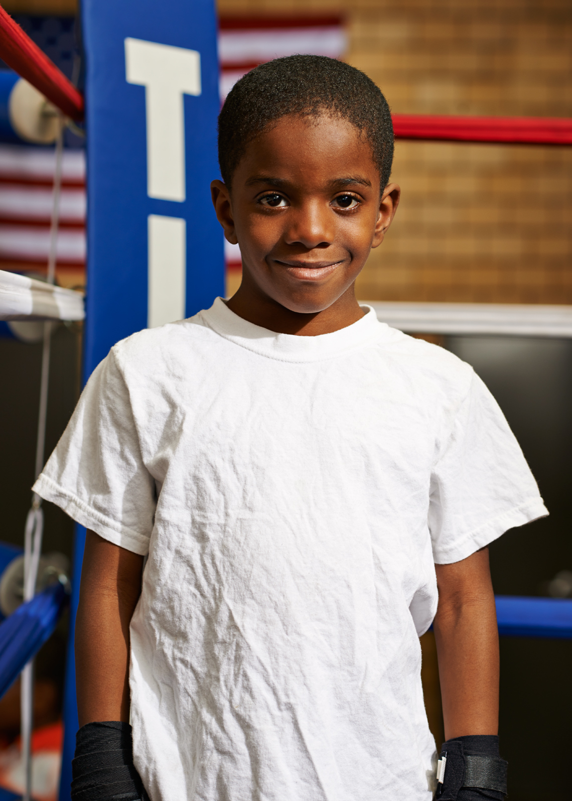 Cute African American Boy in a white tee shirt
