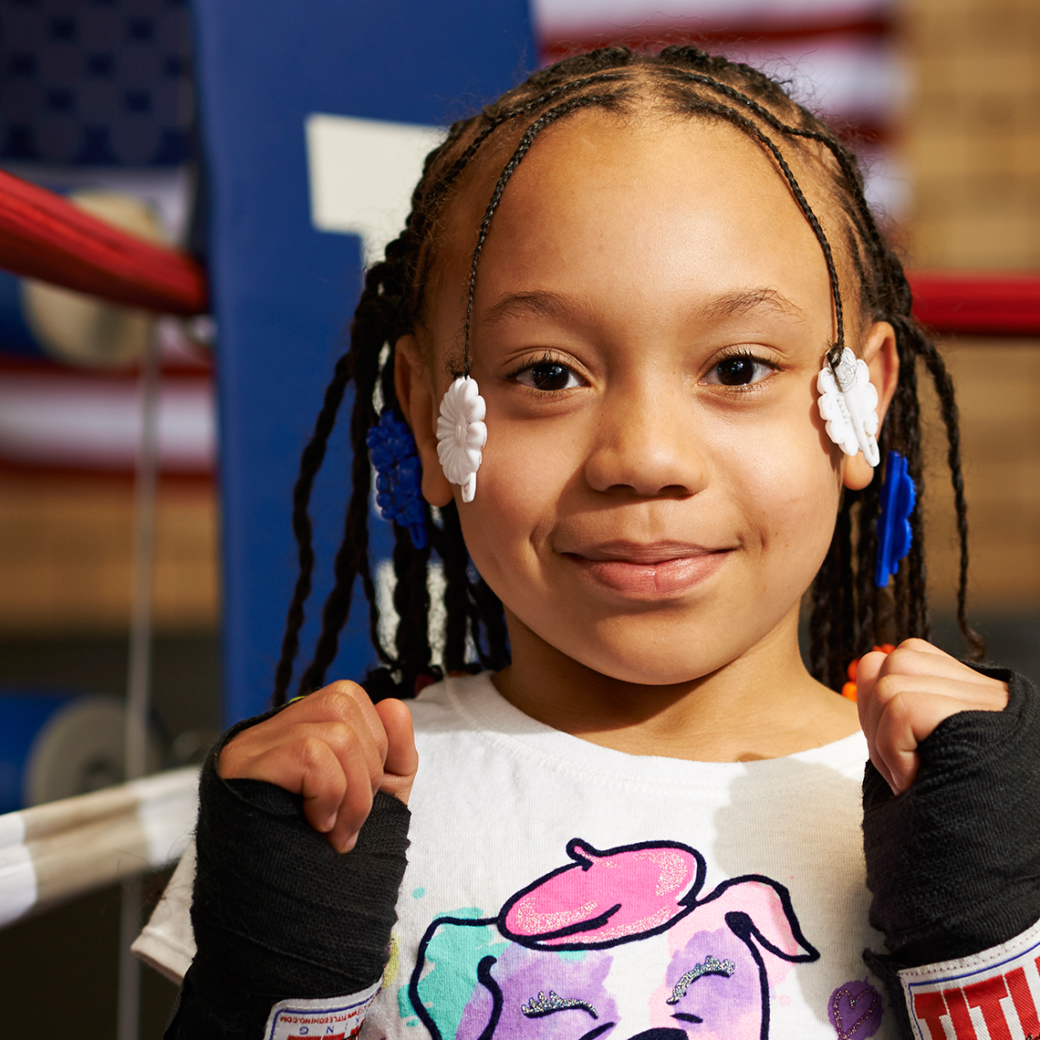 Sweet Little Girl Boxer with Beads and Braids