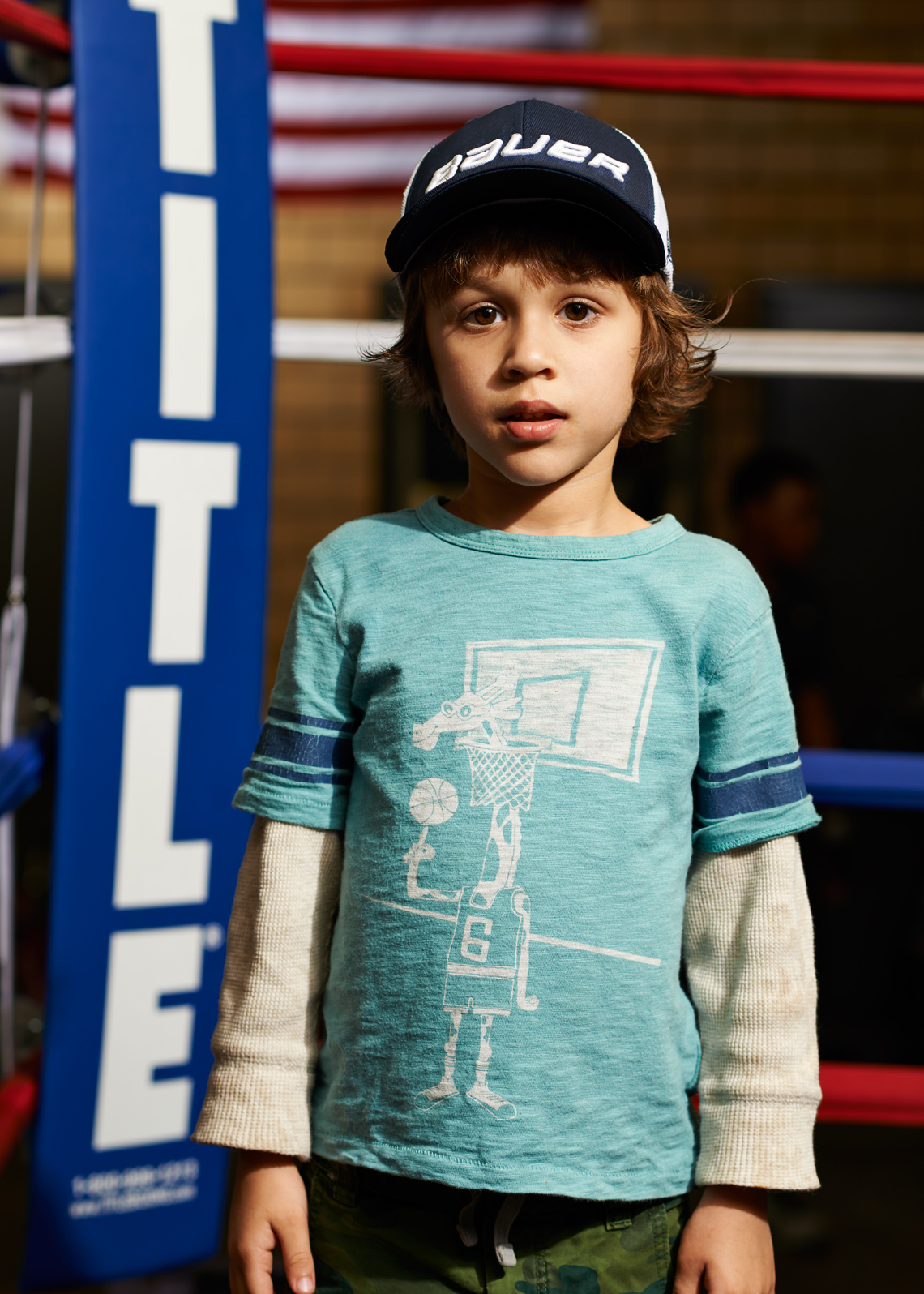 Little boy in the boxing ring