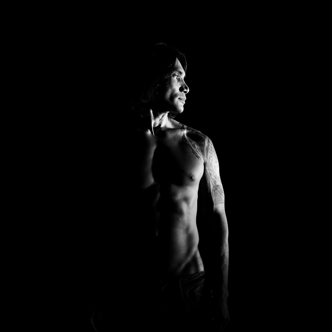 shirtless Fit Asian Man with tattoos_black and white portrait
